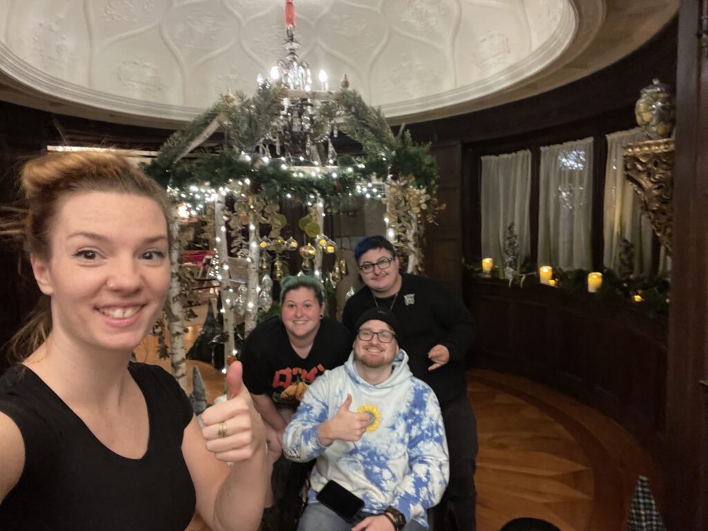 Chloe, Liz, Casey and Beck in front of the decorations at Stan Hywet